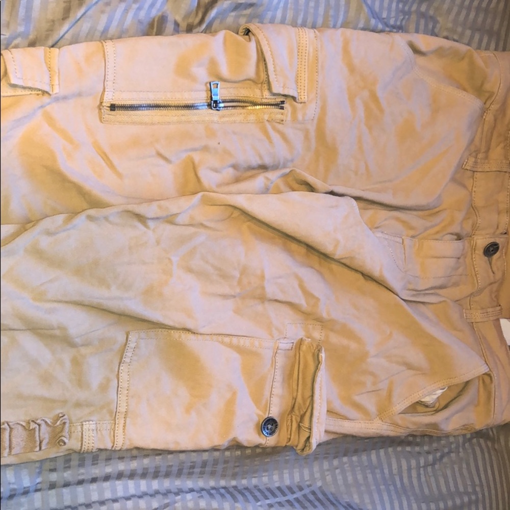 Worn pair of true religion cargos